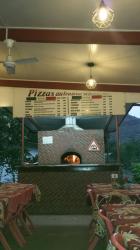 The wood fired pizza oven at the Taiohae pizza restaurant